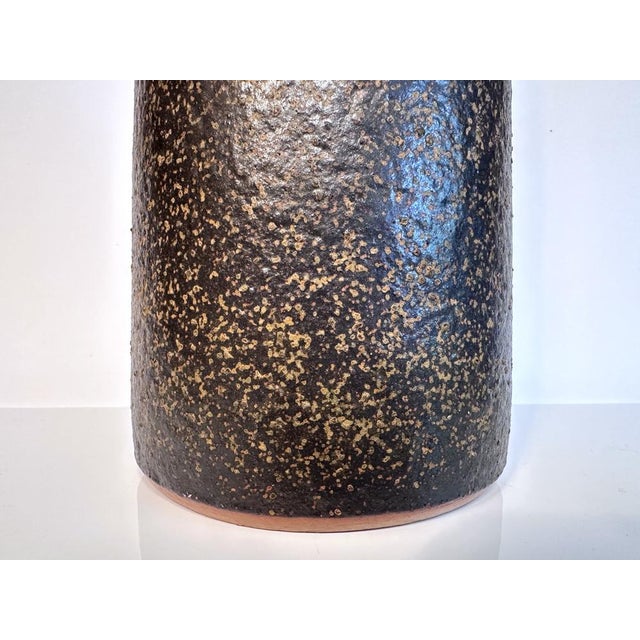 This hand-crafted minimalist design vase from Paul Eydner is made from earthenware. This piece has an attribution mark, I...