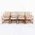 A rare set of eight vintage bamboo and woven leather "Antalya" dining chairs by McGuire, produced in the late 1980s. The...