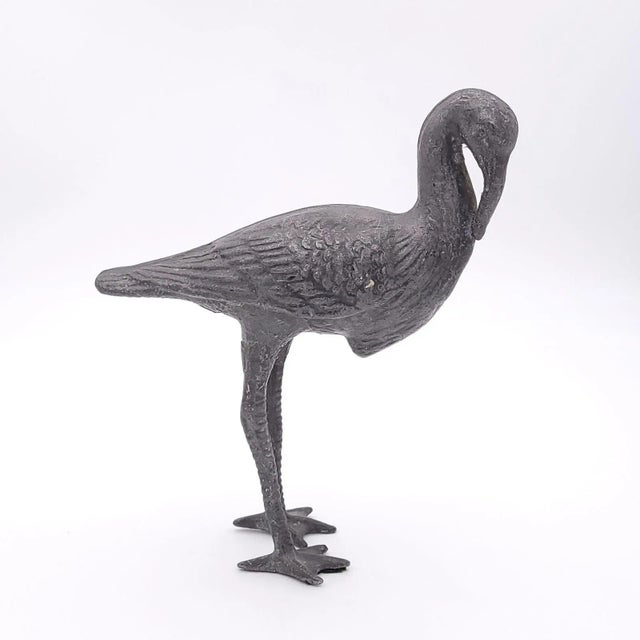 A cast iron stork, circa 1920, exact age and origin unknown.