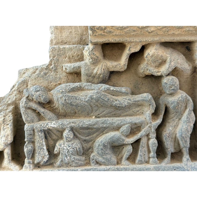 An evocative ancient Gandharan Buddhist gray schist relief depicting the Parinirvana, or death of the historical Buddha...