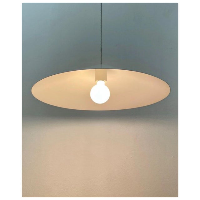 A striking example of danish modern lighting, the focus 1011 xl pendant was designed by renowned danish architects and...