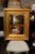This 19th century oil painting, framed in a rectangular giltwood molded and carved frame, depicts two reclining spaniels...