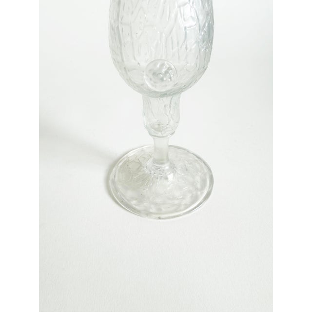 Textured art nouveau handblown iridescent prunted vessel in the style of Loetz.