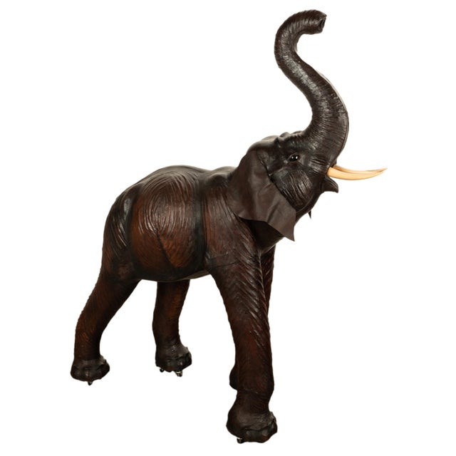 Antique vintage life size leather baby elephant, likely retailed by Liberty of London in the 1930s. This very realistic...
