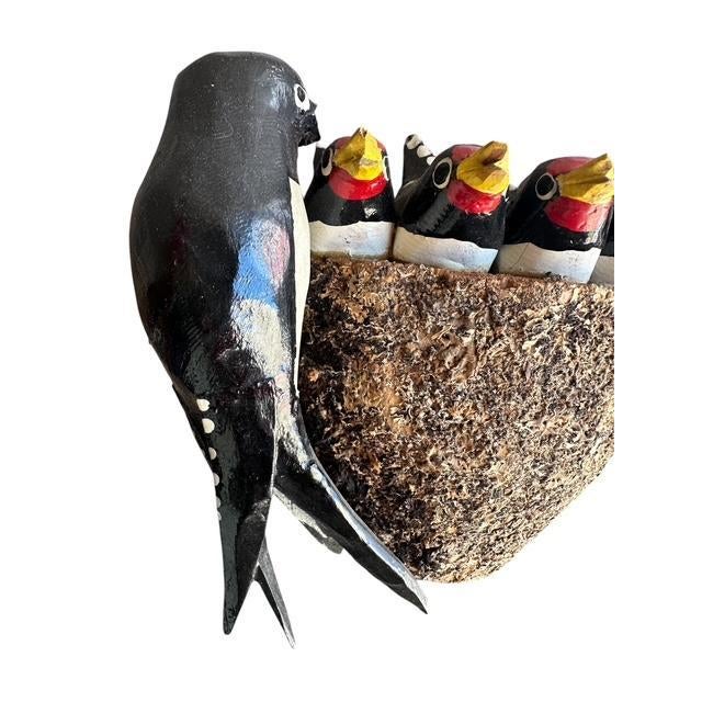 Austrian folk art: wood carved swallows with nest and babies. These wood sculptures are consideed good luck in a home.