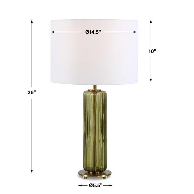 This elegant olive green table lamp is made of transparent glass in a sleek cylinder silhouette. Brass plated metal...