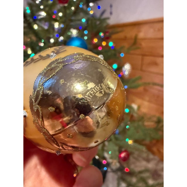 This is a Waterford Holiday Heirlooms Charlemont Gold Egg Ornament. The bottom is marked Waterford with Seahorse....