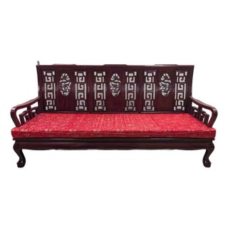 Vintage Chinese Rosewood Three-Seat Sofa With Hand-Carved Dragon Medallions and Red Silk Cushion For Sale