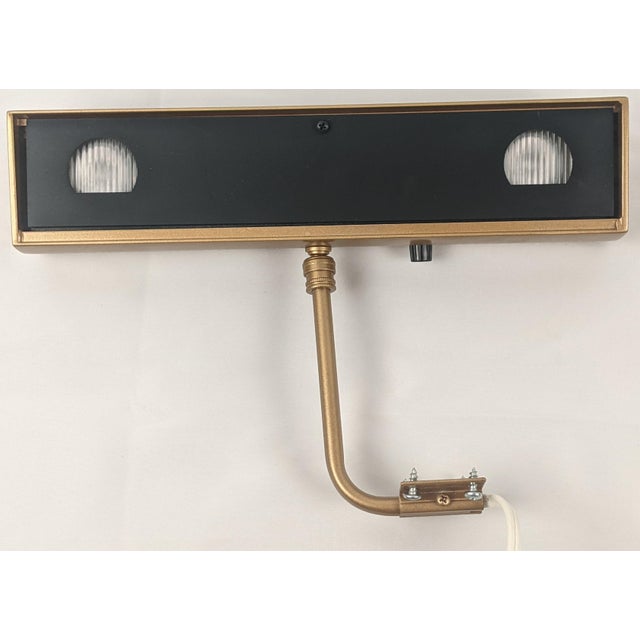 An elegant professional-quality picture light by FineArtLight LLC, from the company's Masterpiece Series – Gallery Series....