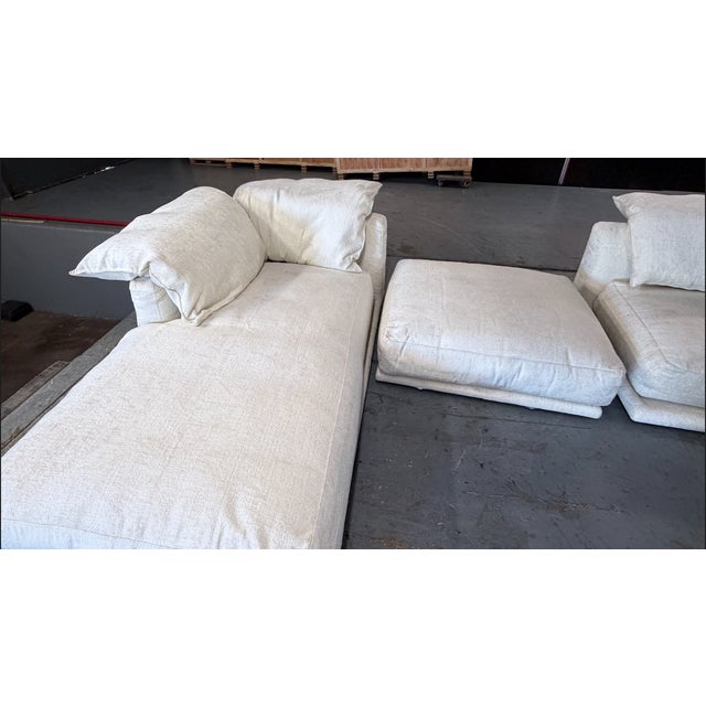 This Jill modular sofa is composed of 3 modular units (1 chaise, 1 chair and 1 ottoman) allowing a myriad of...
