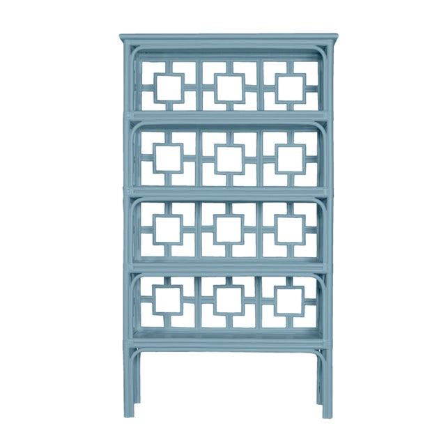 Enhance your space with the chic Sobe Etagere! Crafted with a modern rattan frame and accented with leather bindings, this...