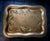 Vintage hand painted Toleware tray by Georges Briard, featuring a folk art and floral motif. Signed lower right.