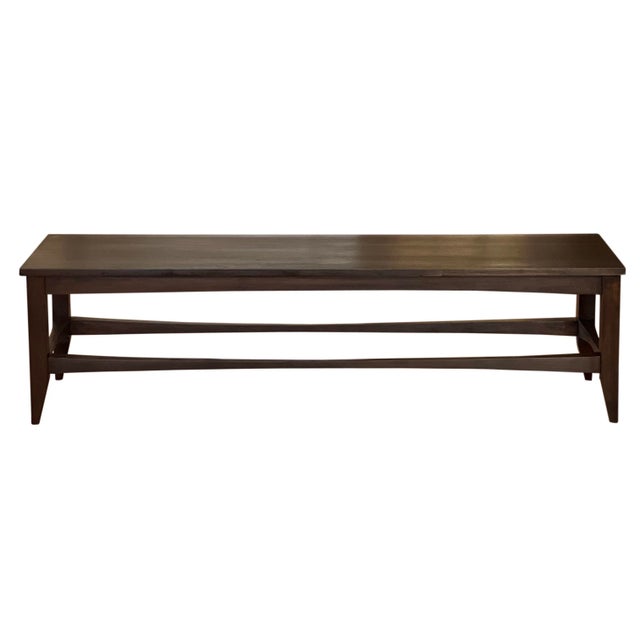 Mid 20th century Scandinavian dark walnut coffee table, 1960s. A sleek table with a slim lined top above a minimalistic...