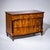 Large Biedermeier chest of drawers featuring three drawers and a subtly bombé lower front. The top drawer is supported by...