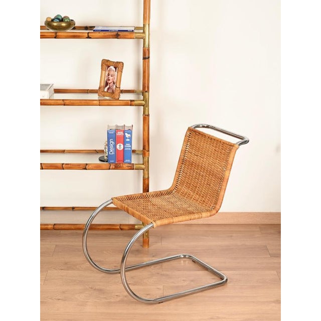 Stunning and rare pair of iconic MR10 cantilever chairs in chromed tubular steel and hand-woven rattan. Designed by Ludwig...