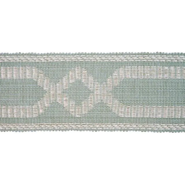 A simple tone-on-tone geometric accessory packs another layer of interest thanks to a rich, raffia-like texture. Sold as a...