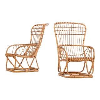 Mid 20th Century A Pair of Rattan Lounge Chairs Attributed to Tito Agnoli For Sale