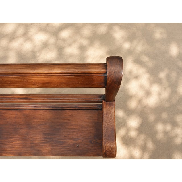 An exceptional large solid oak bench dating from the early 19th century, remarkable for both its generous proportions and...