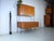 This is a rare teak shelving system from Omnia. The timeless design is by Ernst Dieter Hilker. The simple cabinets are...