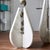 DROP in White Carrara marble in the vase variant h. 37.5 cm is a vase that embodies the strength of marble and the...