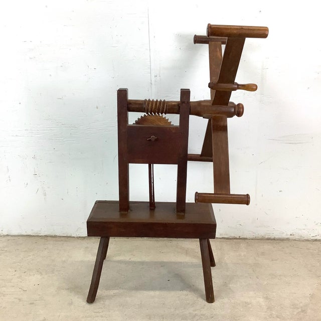 This vintage wooden yarn winder beautifully embodies the artistry and ingenuity of early handcrafting tools. Once...