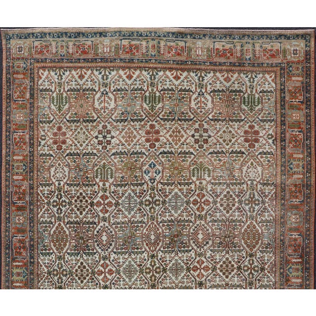 Tribal Antique Persian Joshegan Rug in Ivory Background With Blue, Green, & Copper 7'10 X 10'9 For Sale - Image 3 of 11