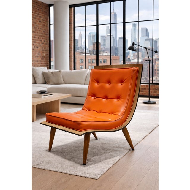 Vintage Mid Century Modern Orange Scoop Lounge Chair by Carter Brothers Inc., circa 1958. This incredible design consists...