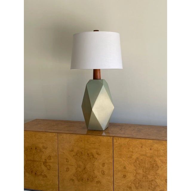 Wonderful and impressive table lamp designed by famed ceramicist duo Jane and Gordon Martz. Color is a sea foam blue/green...
