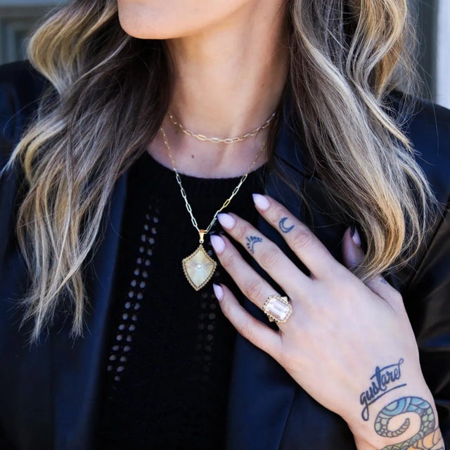 "I hold power and beauty in the palm of my hand. I am both, both are me." Inspired by Queen Elizabeth I, the Liza is a nod...