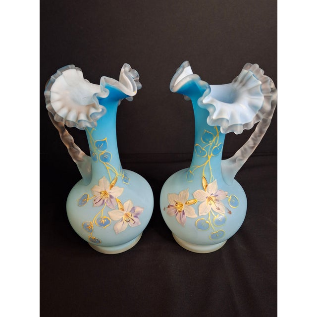 Blue Antique Pair Victorian Blue Satin Cased Glass Pitcher Ewers Hand Painted Orchids Frosted Coral Branch Handles Ruffled Rim - a Pair For Sale - Image 8 of 18