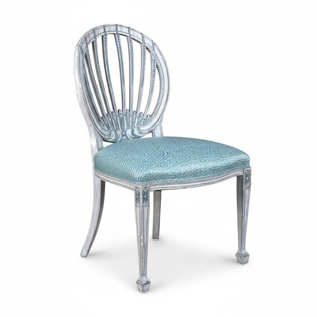 This is a pair of mid-century carved Italian side chairs that have Swedish / Gustavian styling. The fabric is an oiled...