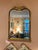 Elegant vintage Friedman Brothers “The Empress” mirror, Model 1816, retaining its original Friedman Brothers label and...
