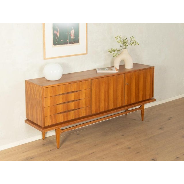 1960s Mid-Century Sideboard very high-quality craftsmanshippremium materialsdovetailed solid wood drawersMade in Germany...