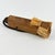 Hand-carved wooden doll from Liberia, featuring a natural raffia fiber skirt. Dolls like this are often made as...