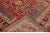 Beautiful Vintage Shiraz hand-knotted Wool rug with the red field. This Shiraz rug has a multicolor accents in all over...