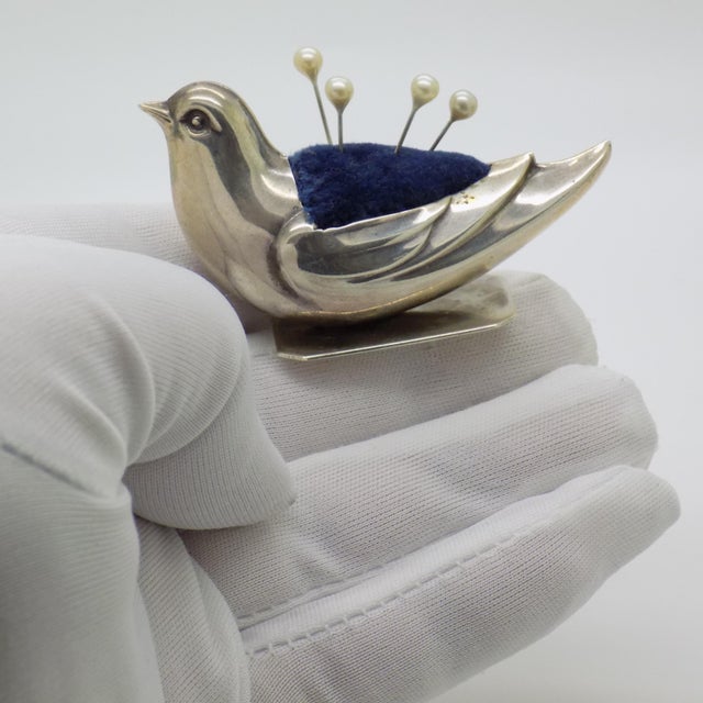 A charming vintage collectible depicting a bird shaped pin cushion, handmade in italy between the 1970s and 1980s in solid...