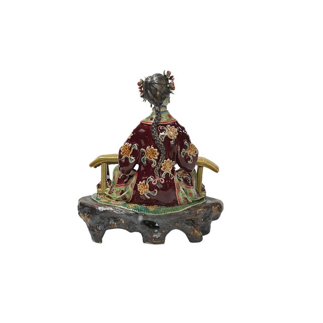 This Chinese Qing style dressing lady figurine is a beautiful and delicate piece of art. It is made of ceramic pottery and...