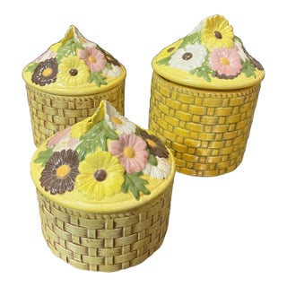 Vintage Trio of Yellow Ceramic Woven Style Jars With Floral Accents For Sale