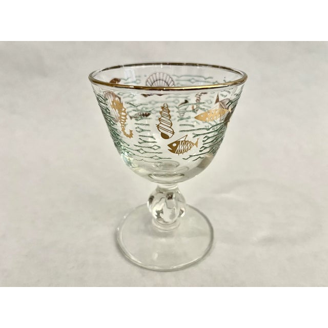 Adorable set of Libbey Mid-Century Atomic Fish, Sherbet/Cordial Glasses. The design is atomic gold fish in water with a...