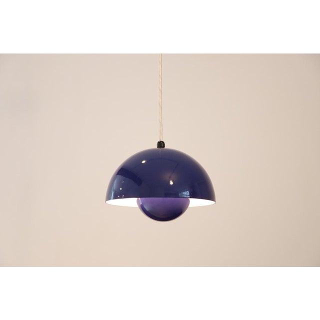 Vintage blue flowerpot pendant lamp by Verner Panton for Louis Poulsen. This iconic lamp in a bright blue color is a real...