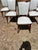 Set of 6 Mid-Century Modern Dining Chairs featuring elegant walnut frames with tapered legs and brass-capped feet. Newly...