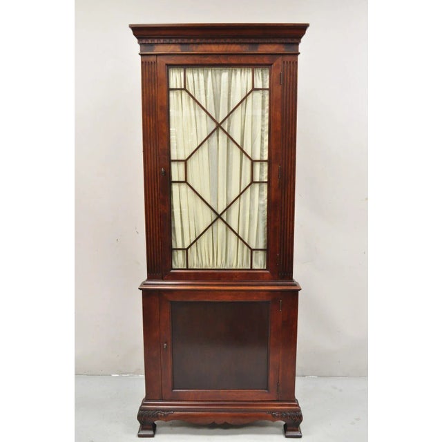 Vintage Georgian Style Mahogany Corner China Cabinet with Glass Front Lattice Door. Circa Mid 20th Century. Measurements:...