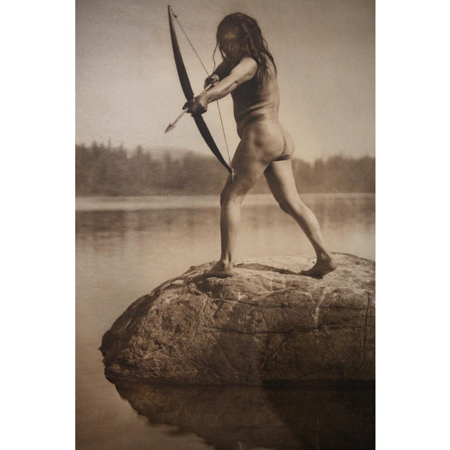 An original vintage photogravure from Edward S. Curtis's The North American Indian, Portfolio XI (published 1916), "The...