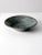 This is a vintage studio pottery bowl, signed by the artist. Handcrafted with a softly organic form, the bowl features a...