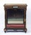 This is a beautiful antique Victorian amboyna and ebonised pier cabinet, circa 1850 in date. The rectangular amboyna top...