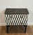 This beautiful and decorative little chest of drawers with two drawers features a trompe-l'oeil patinated checkerboard. It...