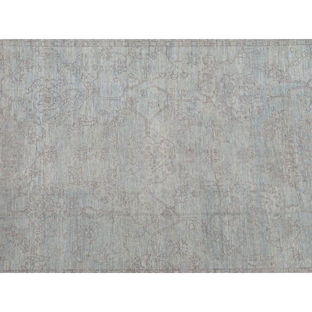 Light lavender and very finely woven Transitional rug in light blue background of lavender highlights. Keivan Woven Arts...