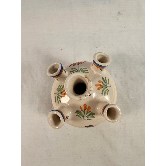 A rare treasure for any Quimper collector. This particular type of vase is often called a quintal or tulip vase. It was...
