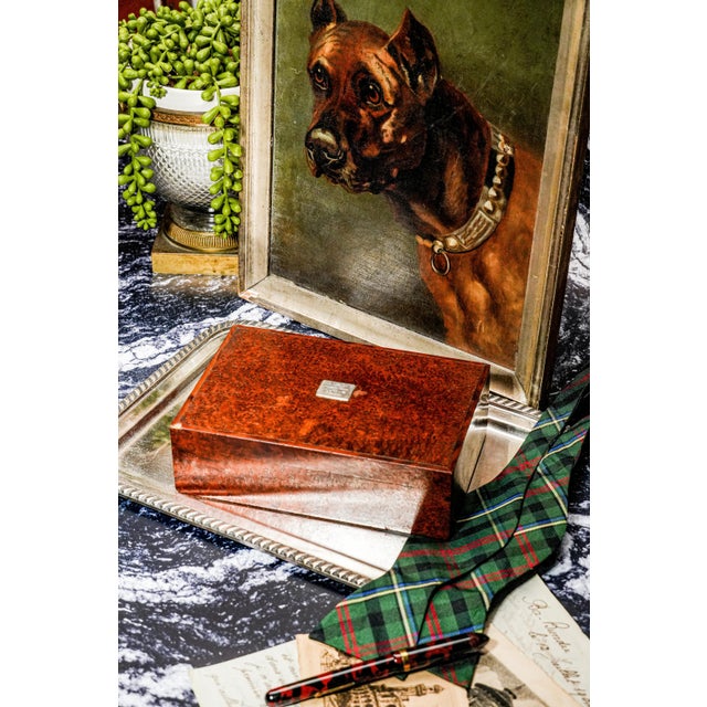 Elevate your collection with this stunning solid wood box, a beautifully crafted piece dating back to 1930. Exuding...