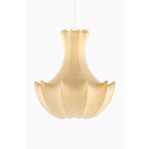 This rare and large ceiling lamp, produced in Italy during the 1960s, is designed in the style of Achille and Pier Giacomo...